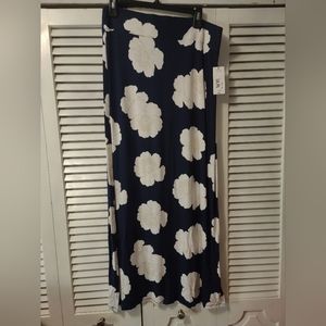 A N.A. brand long skirt in Navy, white and cream